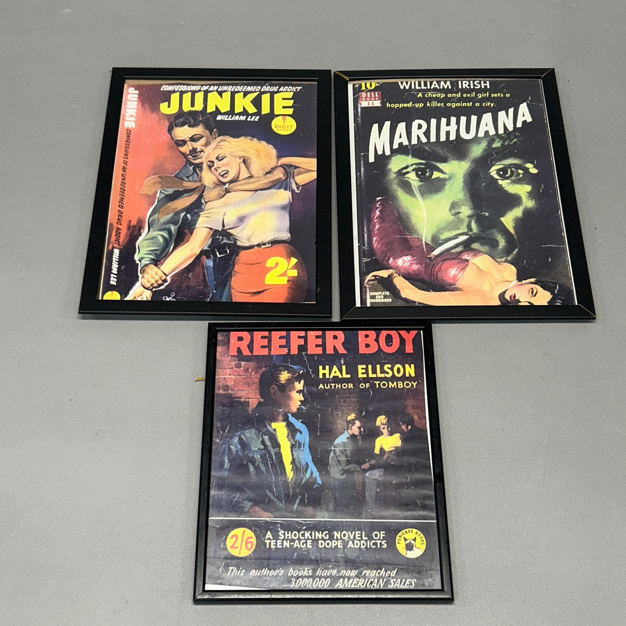 THREE FRAMED ADVERTISING PRINTS.