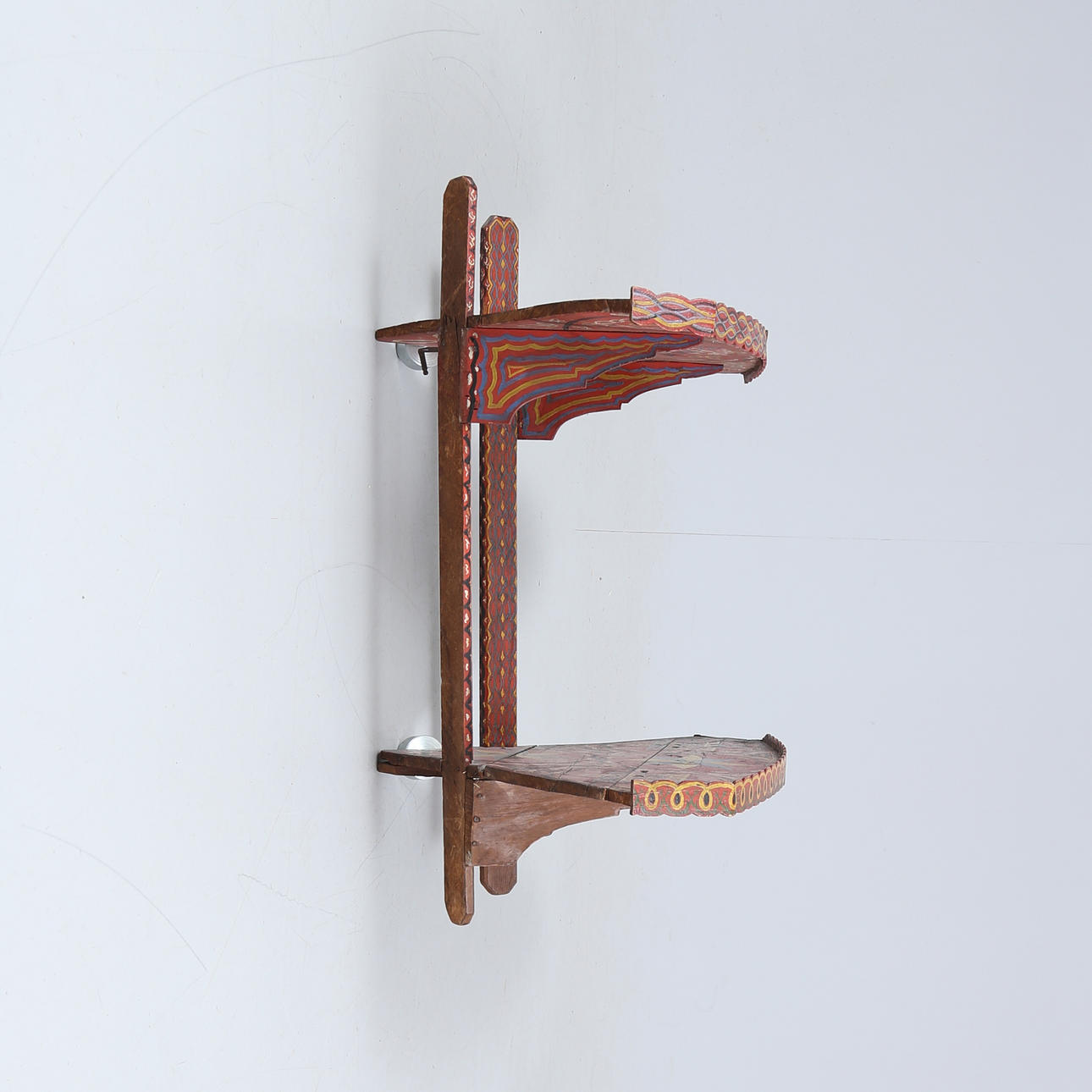 An almoge shelf, corner model, dated 1878.