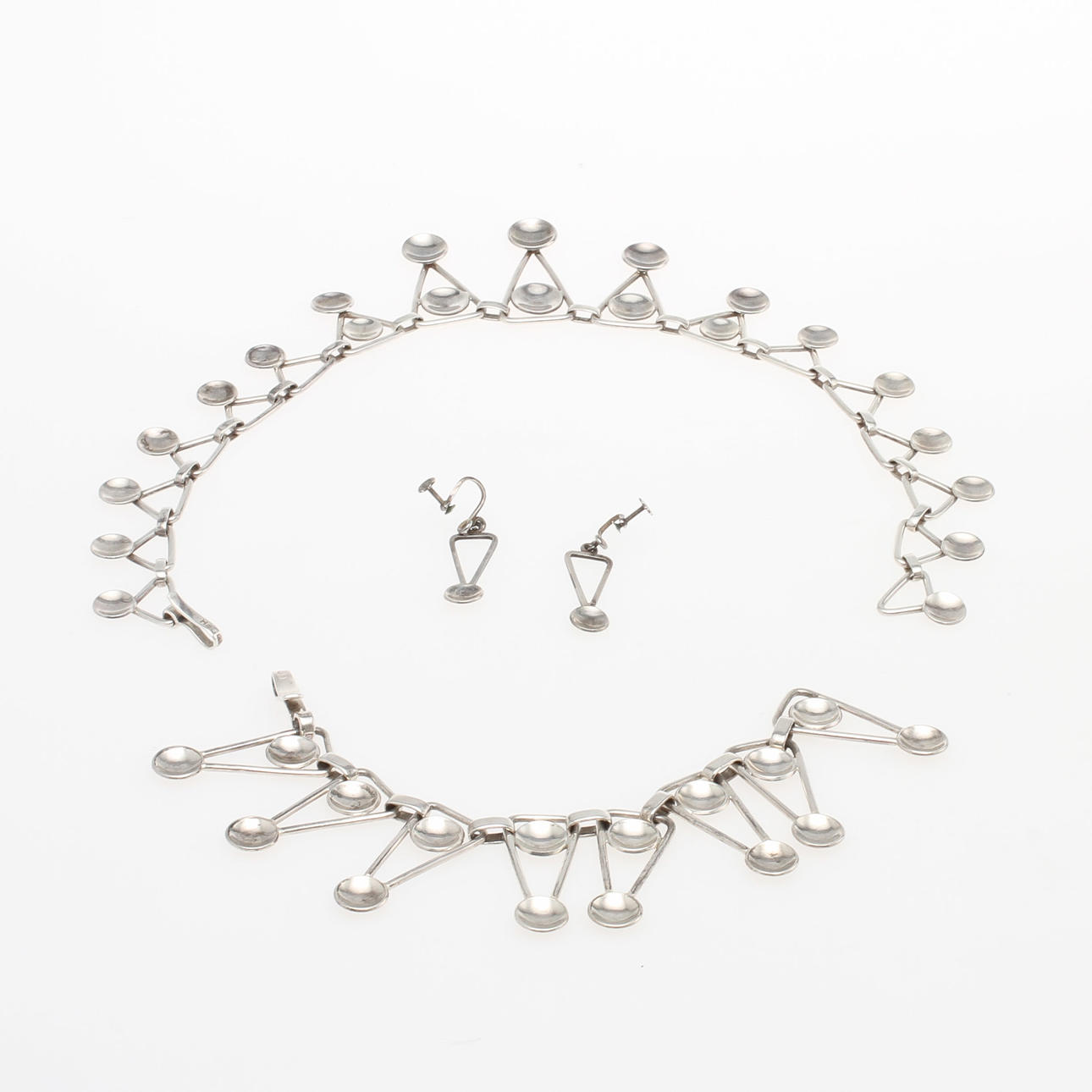 SMYCKESGARNITYR, 4 delar, silver, Sven-Erik Högberg. Vikt total 120 gram.