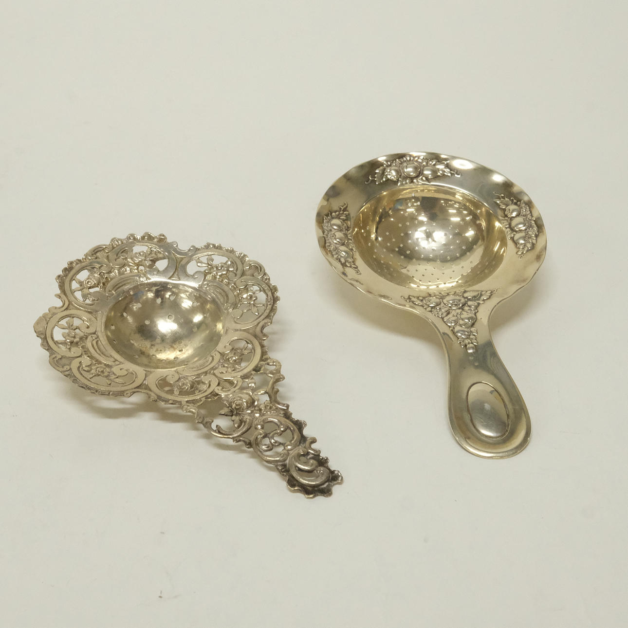 TEA STRAINER, SILVER, TWO PIECES.