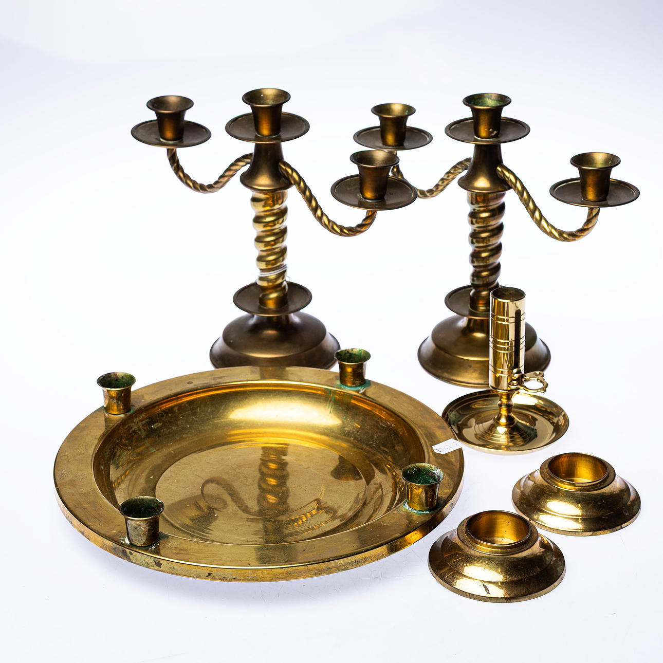 CANDLESTICKS, a batch of brass.