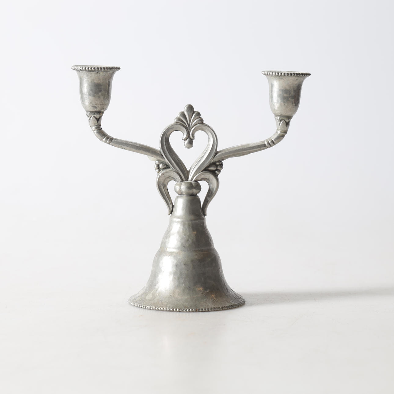 A pewter candelabra, Gerotin, 20th century.