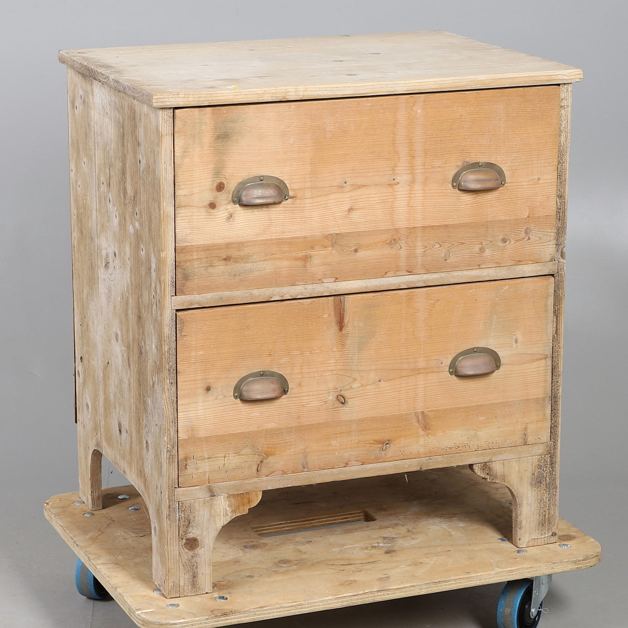 A PINE TWO DRAWER CHEST.