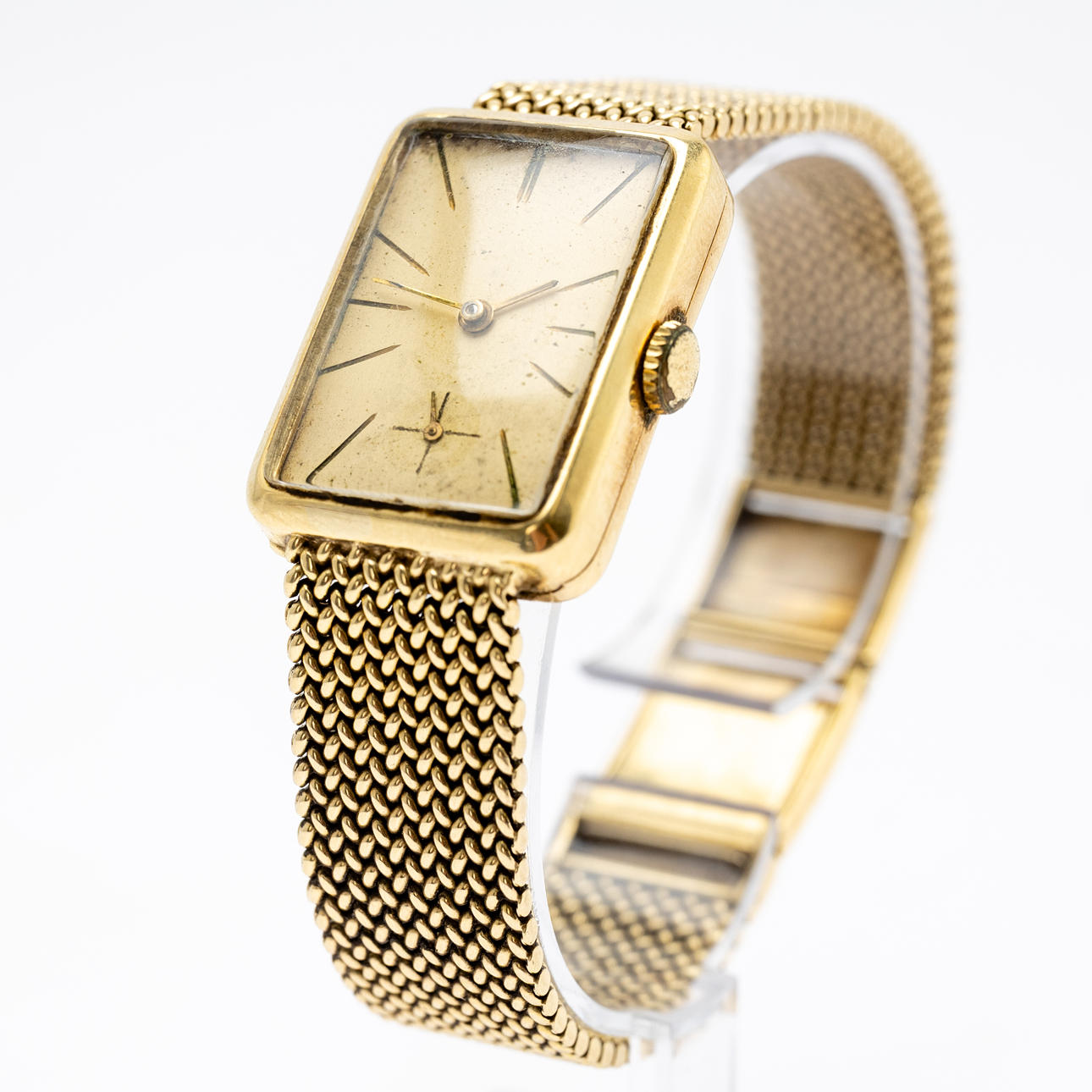 gold wristwatch.