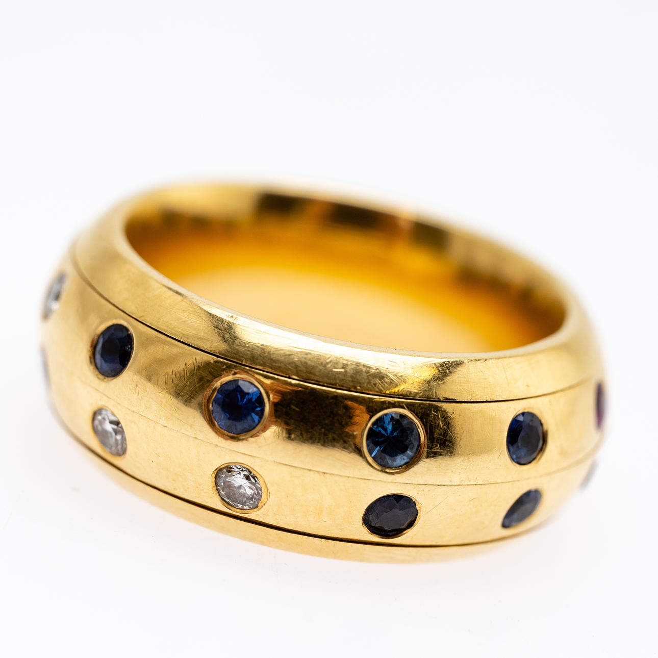 Ring with rubies, sapphires and diamonds.