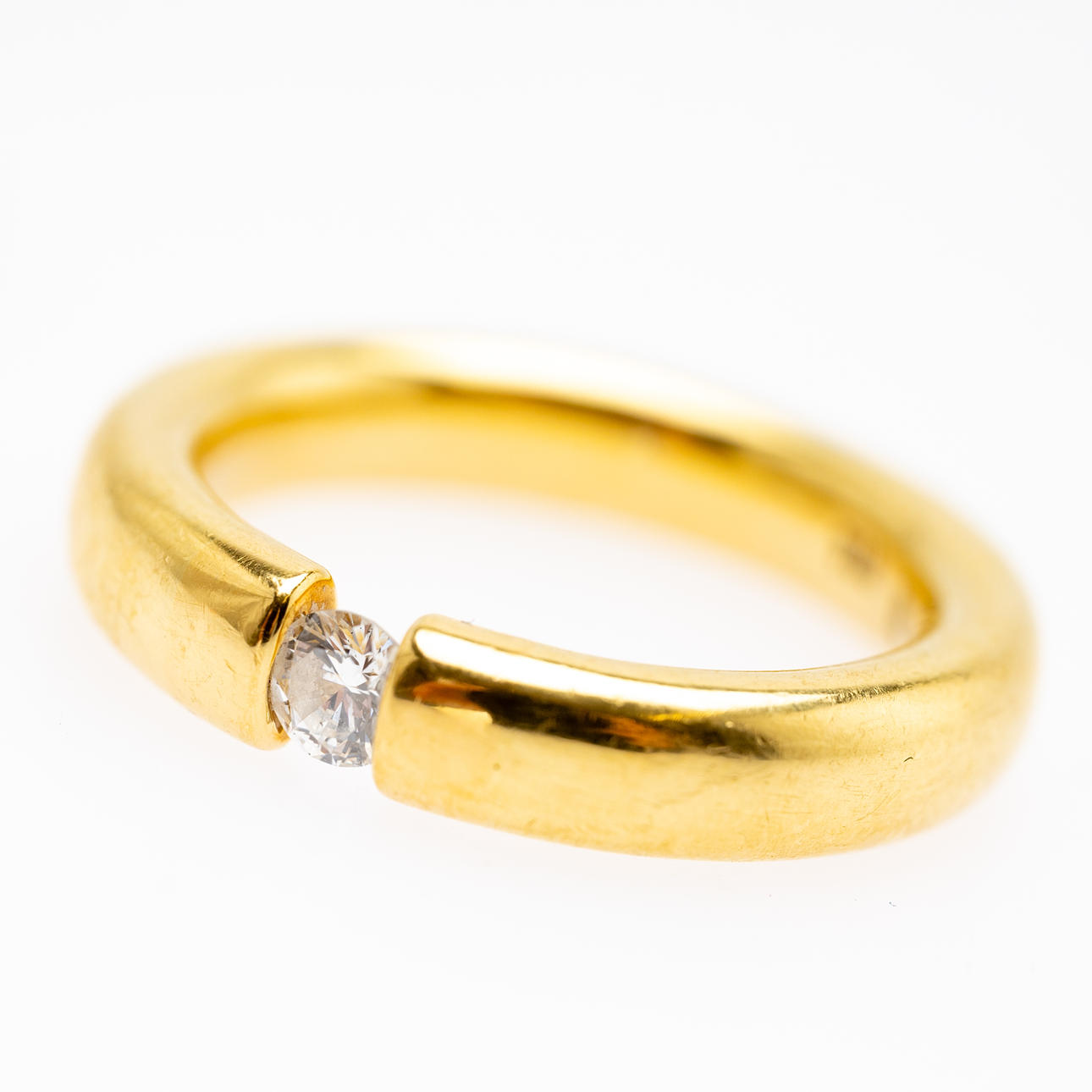 Ring with a diamond.