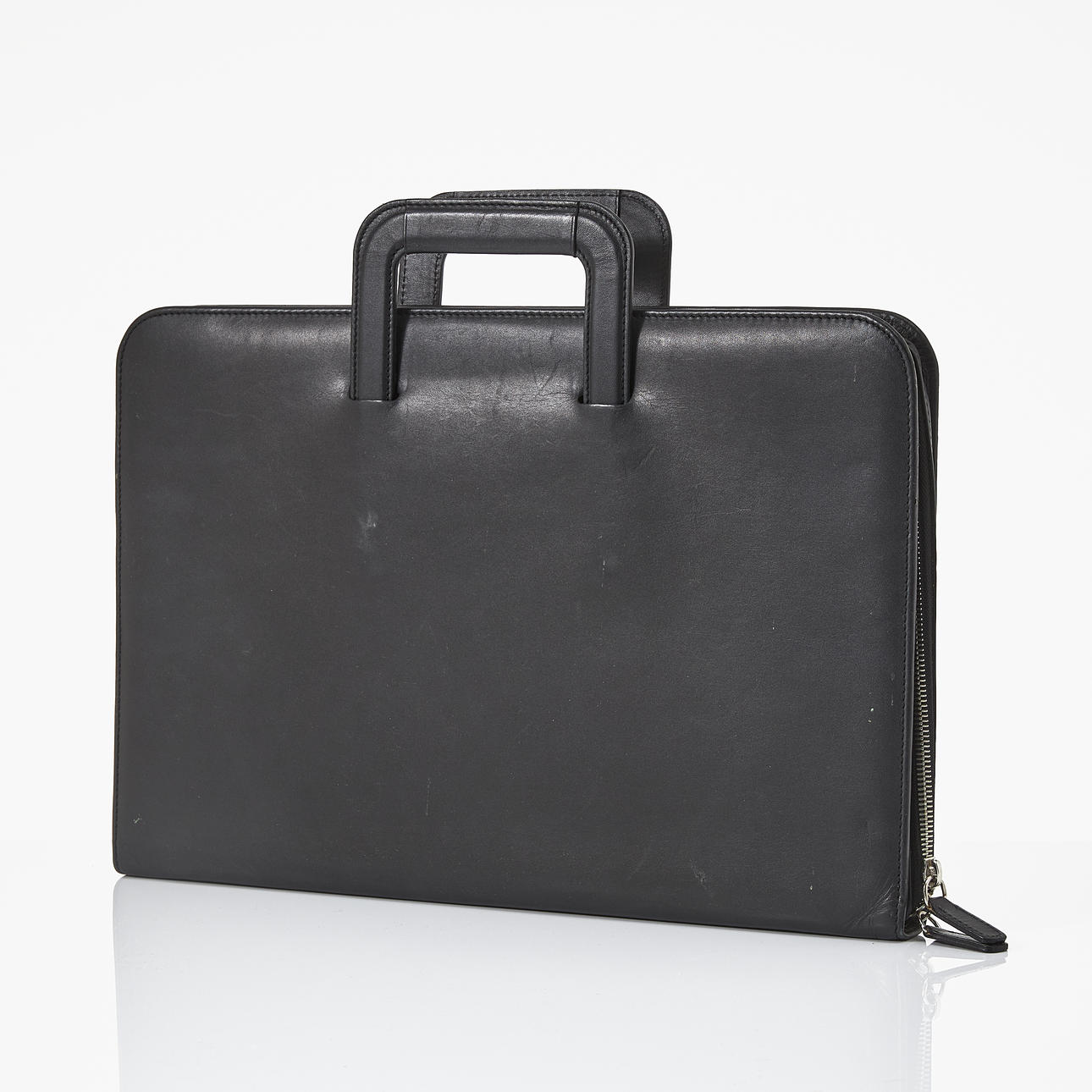 PALMGRENS, briefcase/computer case, black leather, interior with four compartments, embossed marking Palmgrens established 1896 Stockholm.