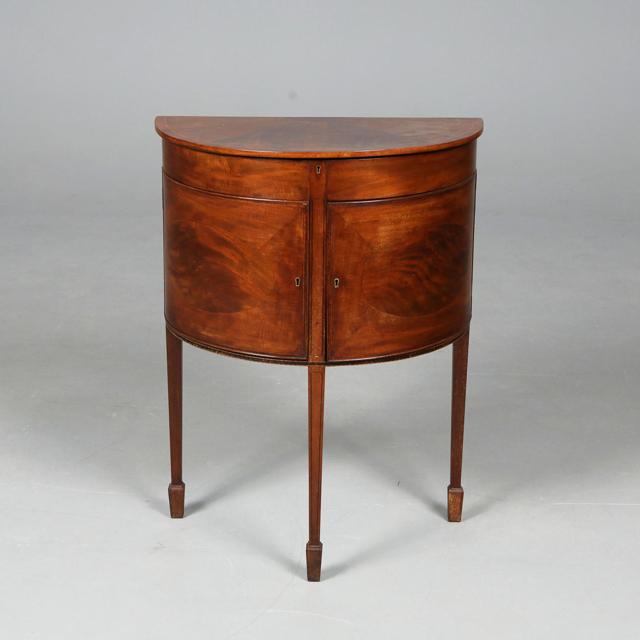 BOWFRONT WORK TABLE.