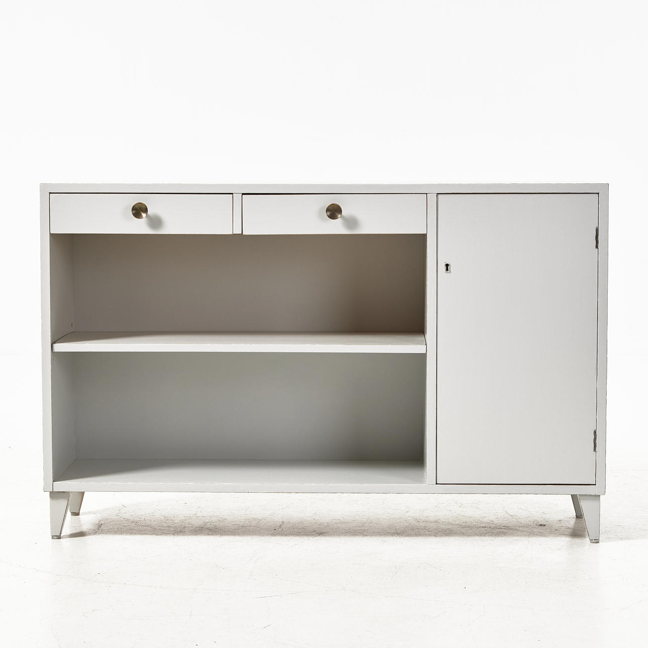 Bookcase, with cupboard, mid 20th century, painted, brass drawknobs.