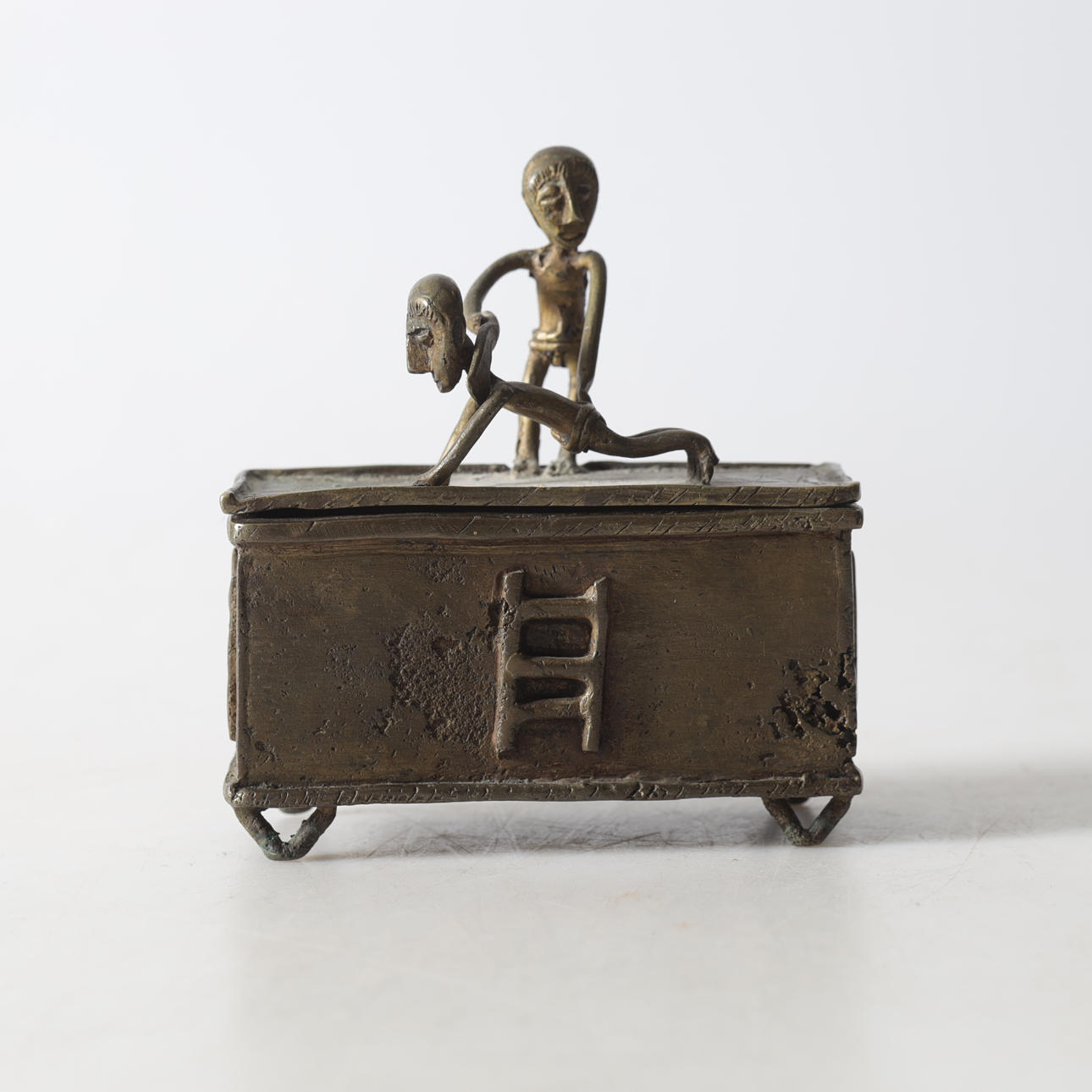 A lockbox, yellow metal, 20th century.
