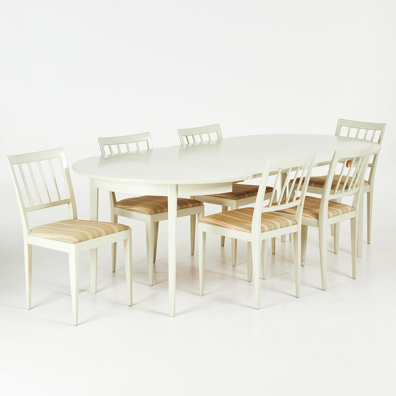CARL MALMSTEN. Dining room group, 7 pieces, dining table with 2 inserts + 6 chairs, Åfors furniture Blomsterpaint, 20th century.