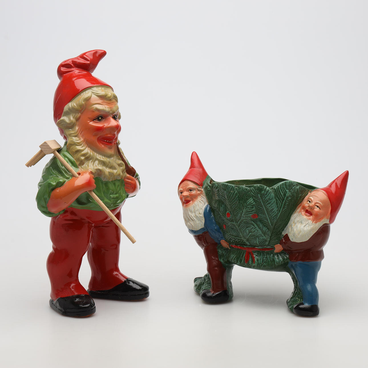 FIGURINE and OUTER LINING, 2 pieces, gnomes.