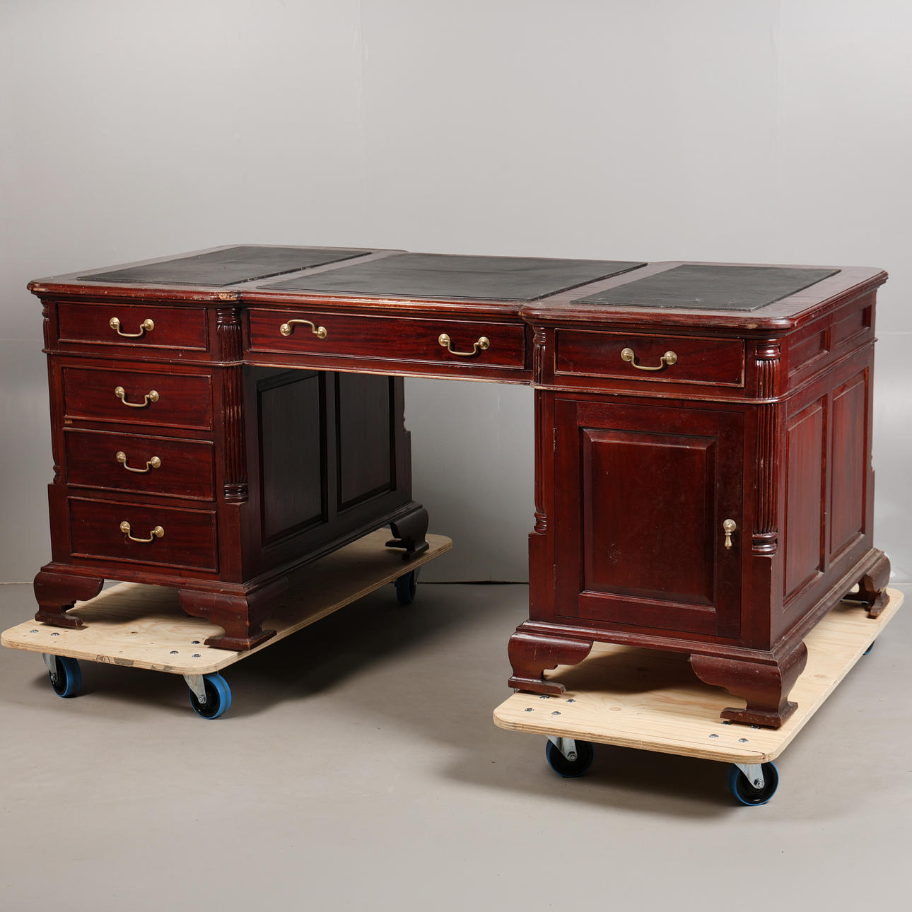 A GEORGE III STYLE PARTNERS WRITING DESK.