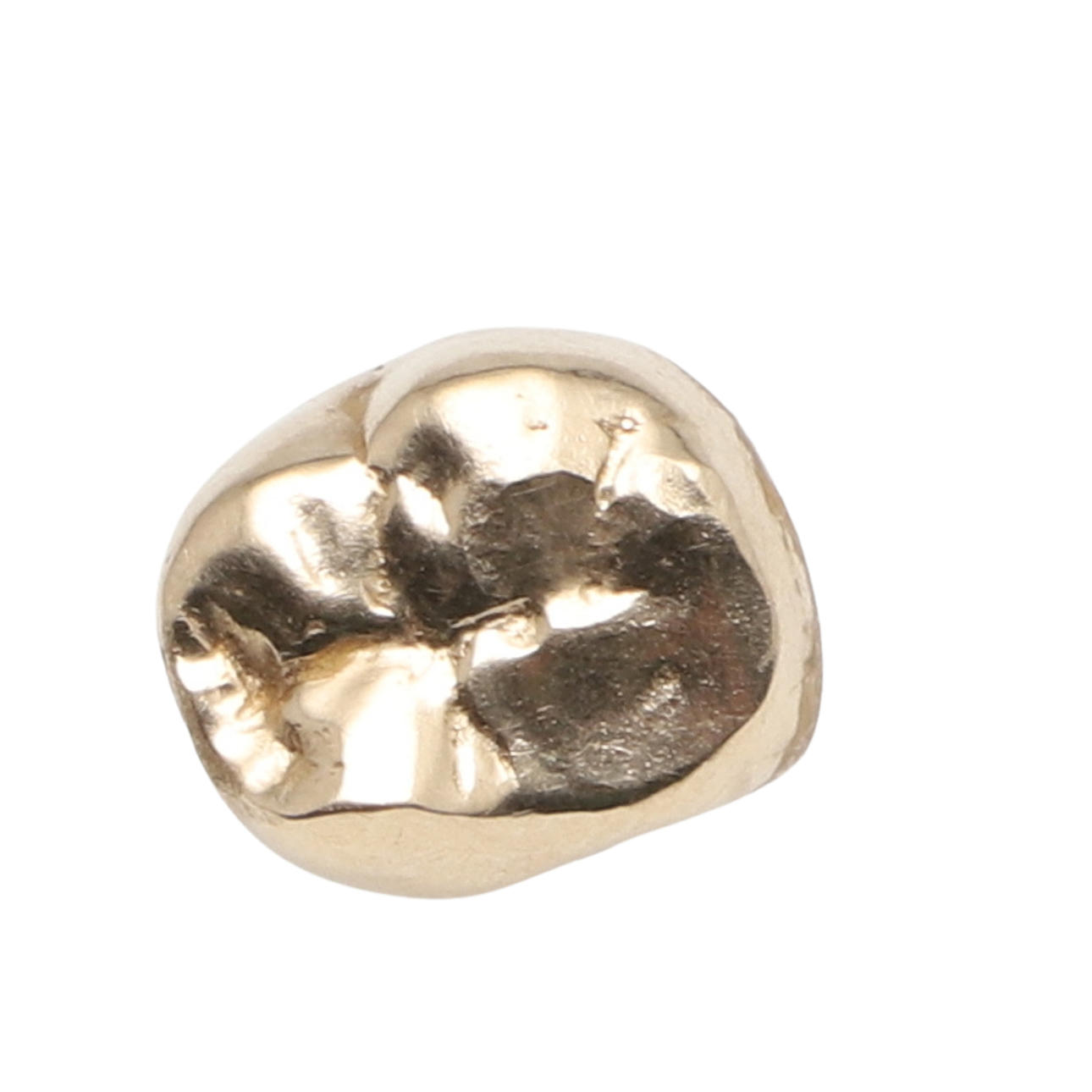 A GOLD FILLING. APPROXIMATELY 4 GRAMS.