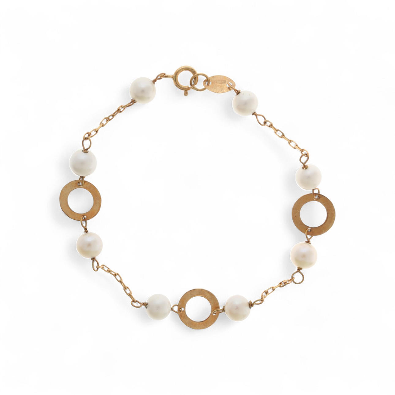 Bracelet in gold and pearls.
