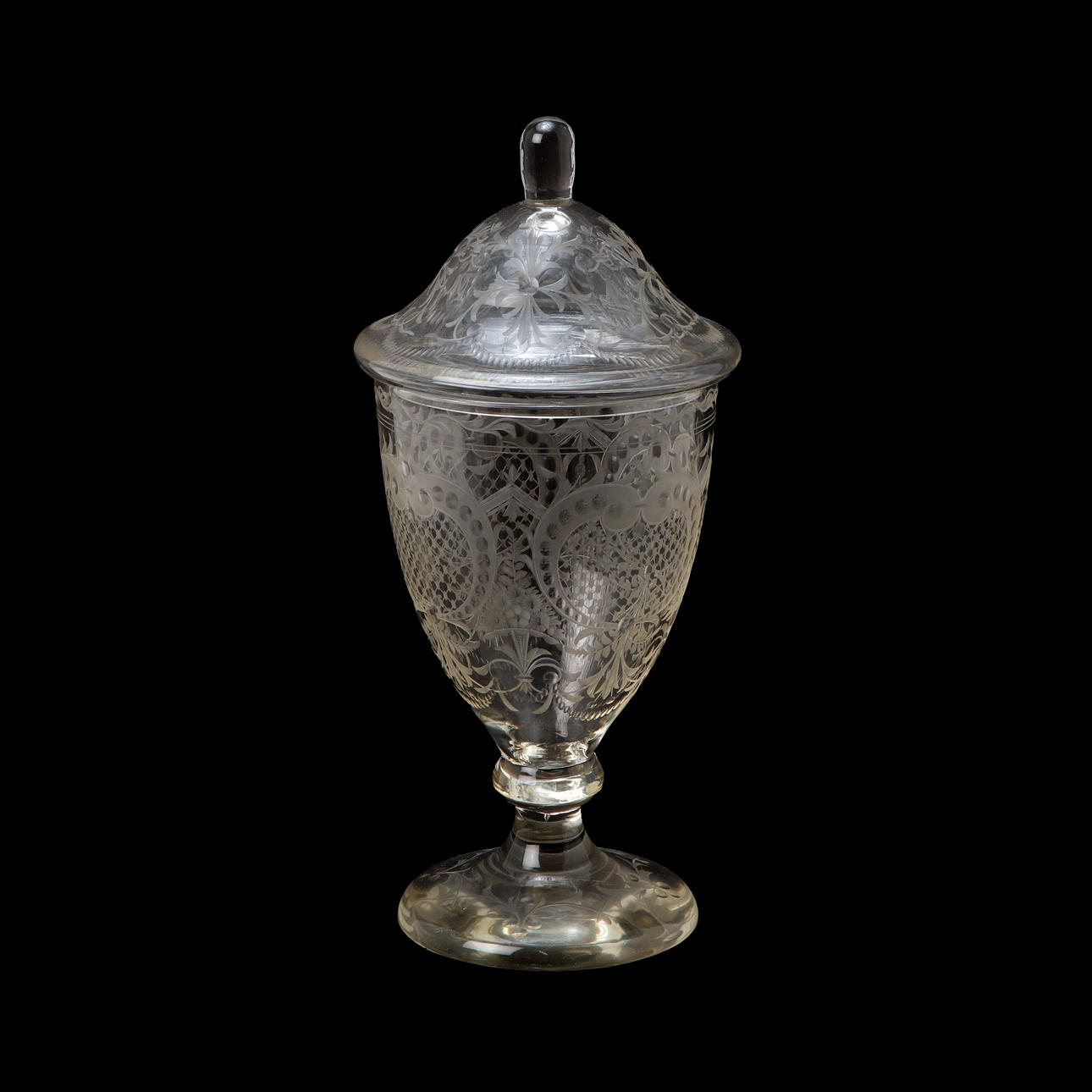 A 20th century glass lockcup.