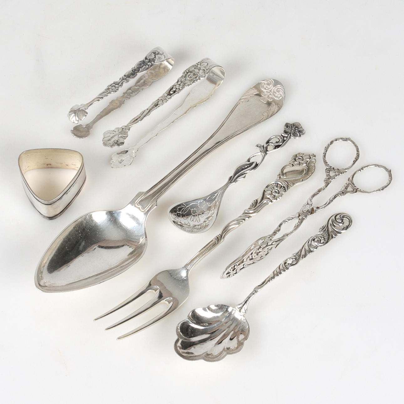 BESTICKDELAR, 8 delar, silver, 1900-tal.