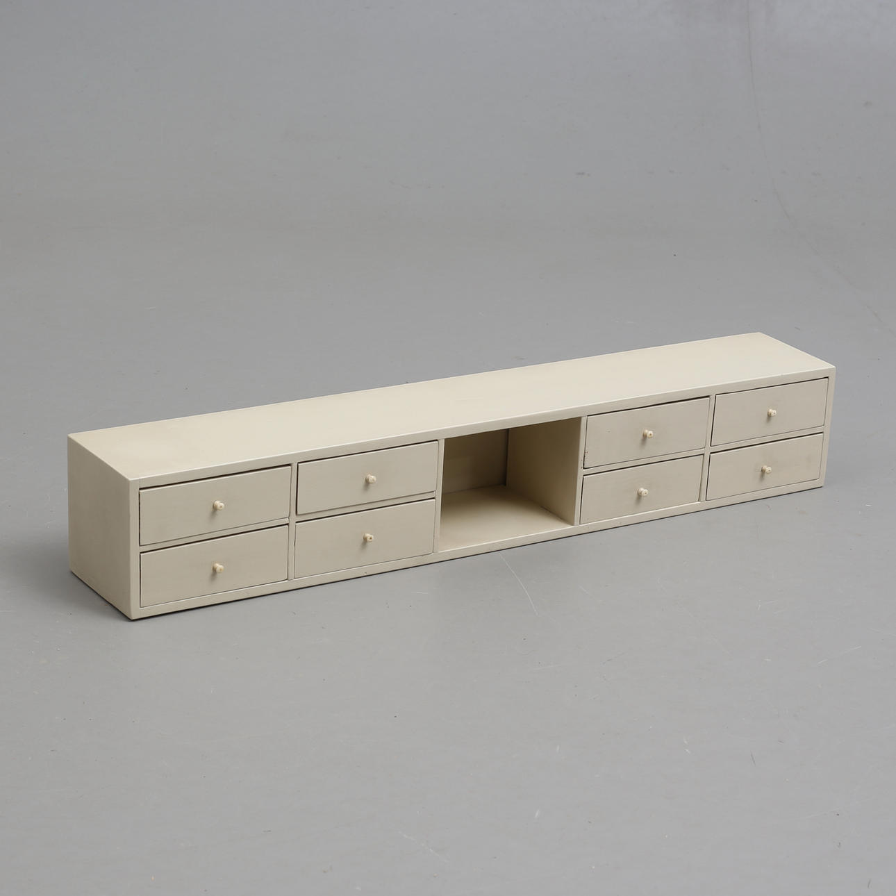 A wall shelf with drawers, mid 20th century.
