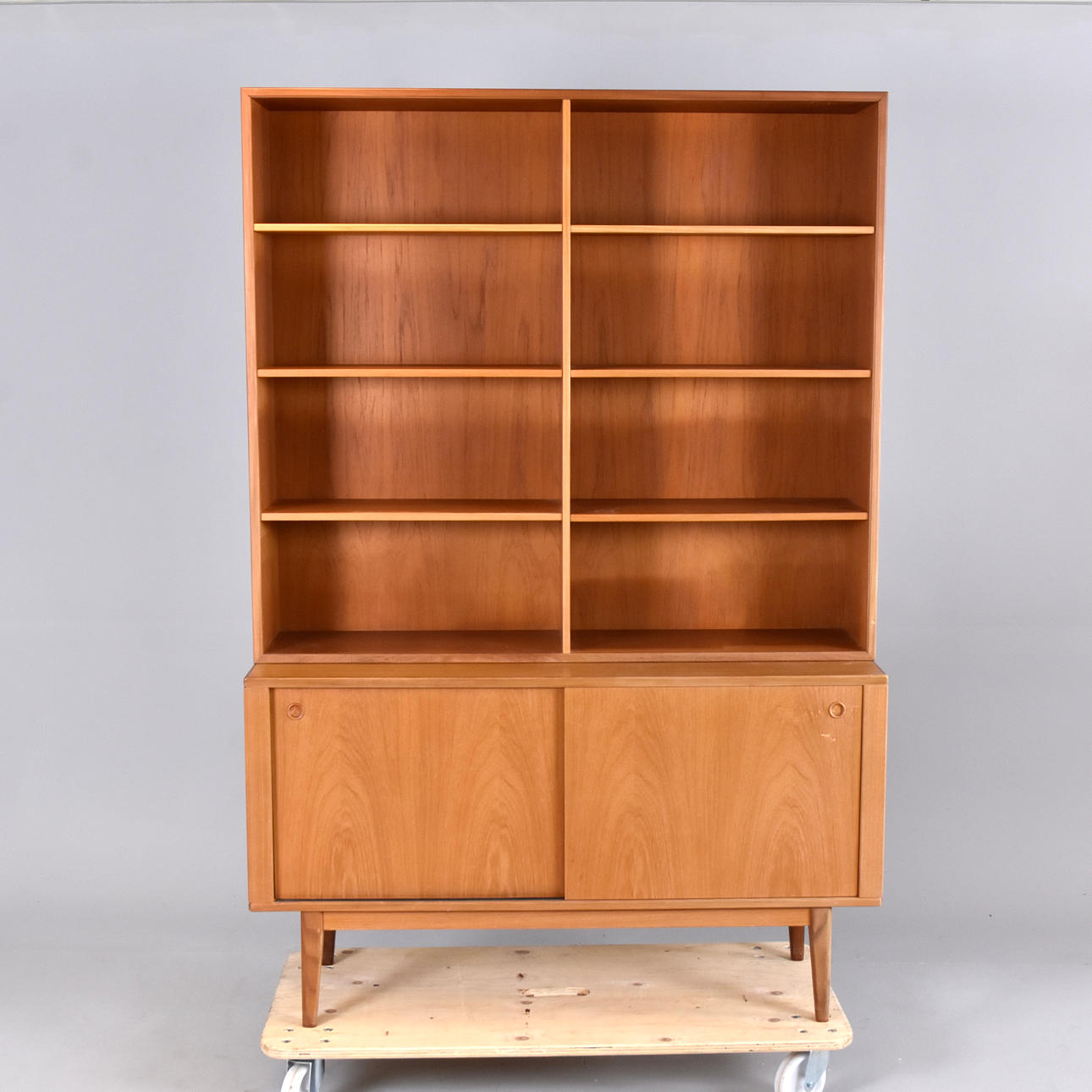 A teak bookcase, two sections, 1960s.