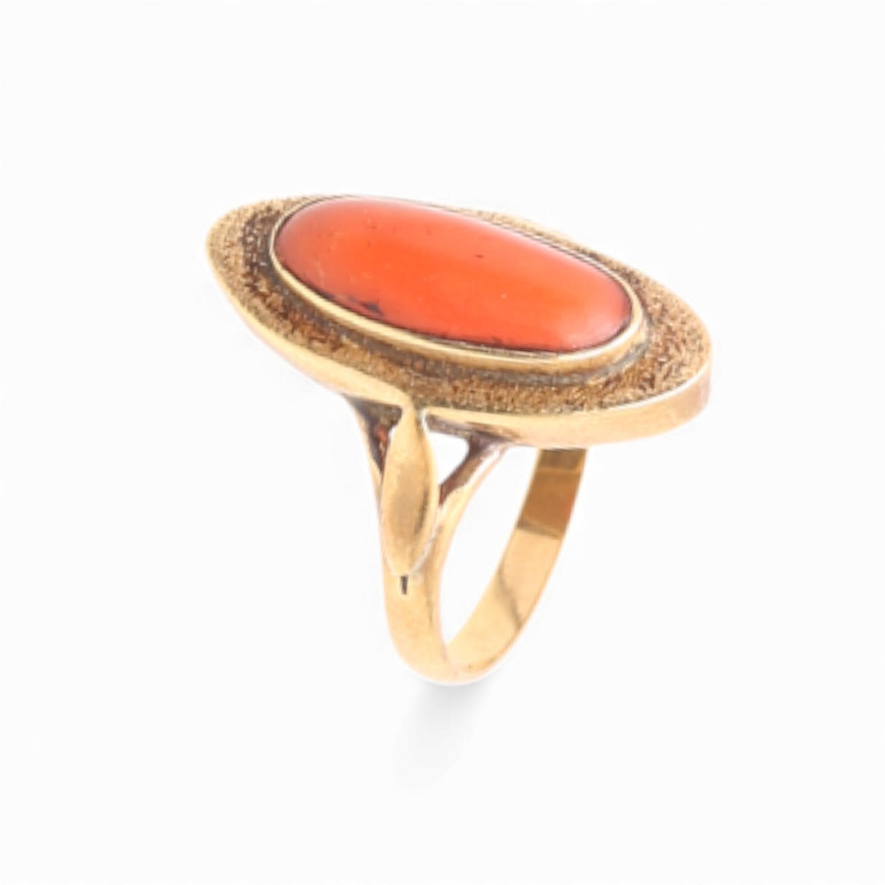 Gold and coral ring.