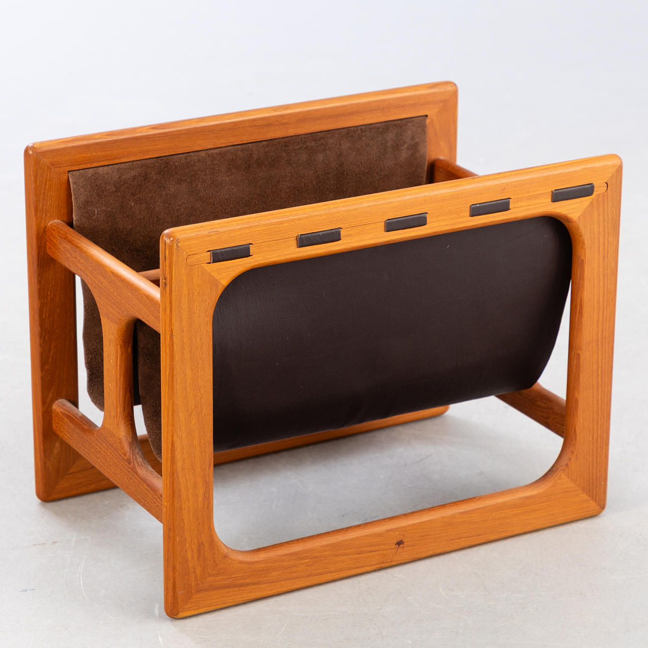 Magazine rack, teak and suede.
