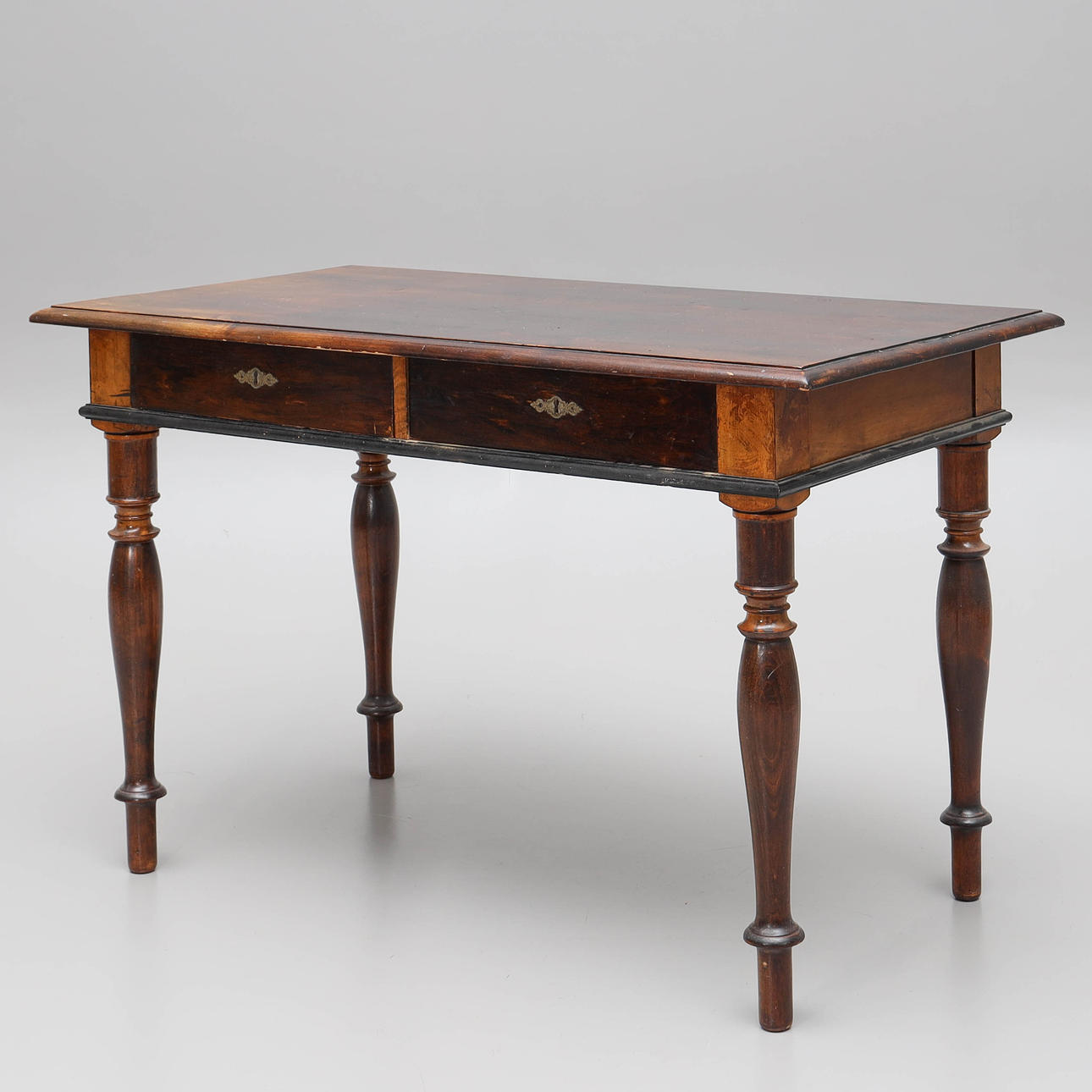 A stained spruce desk, Neo-Renaissance.