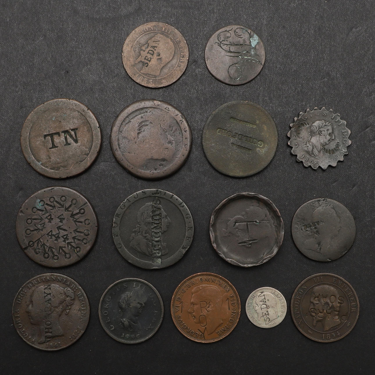 AN INTERESTING COLLECTION OF COUNTERMARKED AND ENGARVED COINS. Coins ...