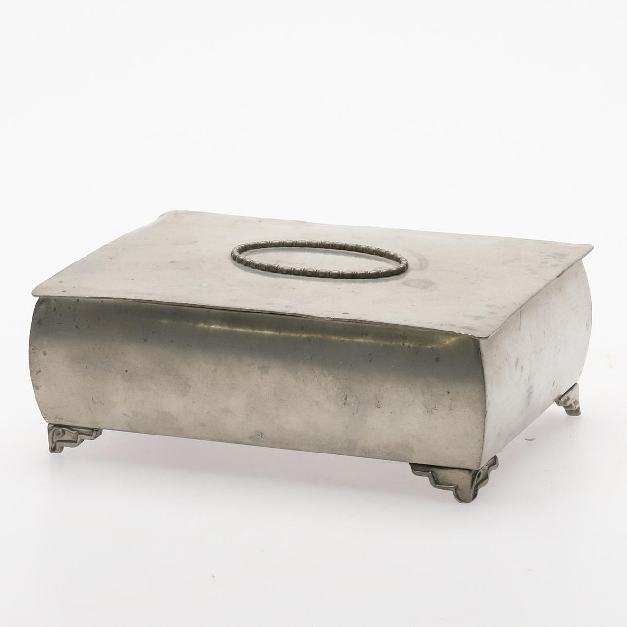 CASKET. Pewter with wooden inside, -1931.
