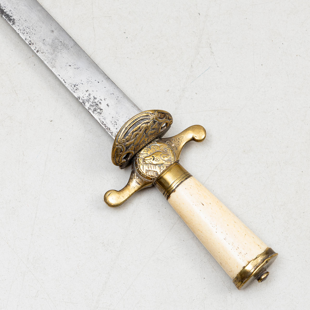 A 20th century German brass and bone HIRSCHFÄNGER.