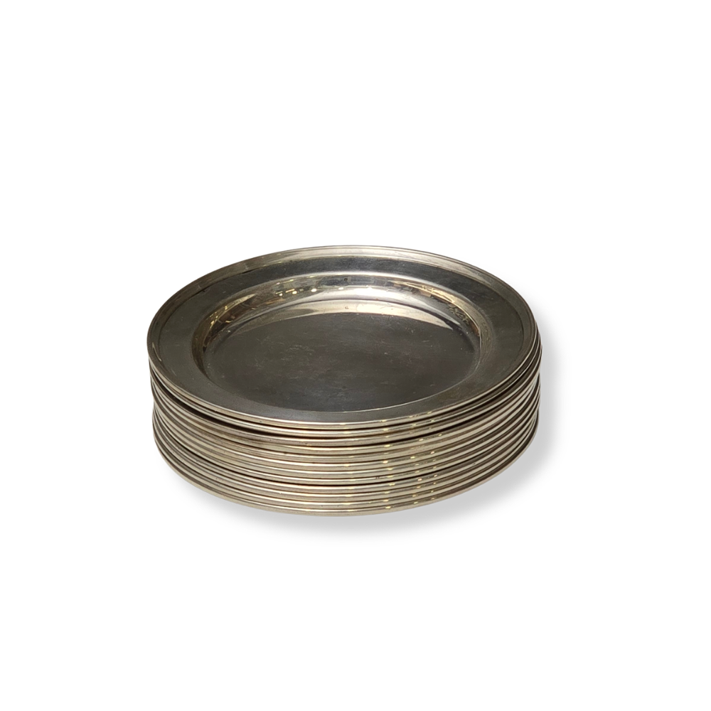 ROCA JEWELRY. 12 BREAD PLATES IN PUNCHED SILVER.