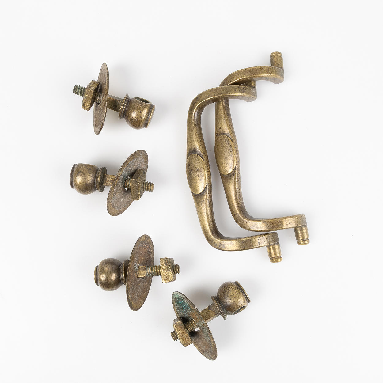 A BRONZE HANDLE, 18th century, for a drawstring chest.