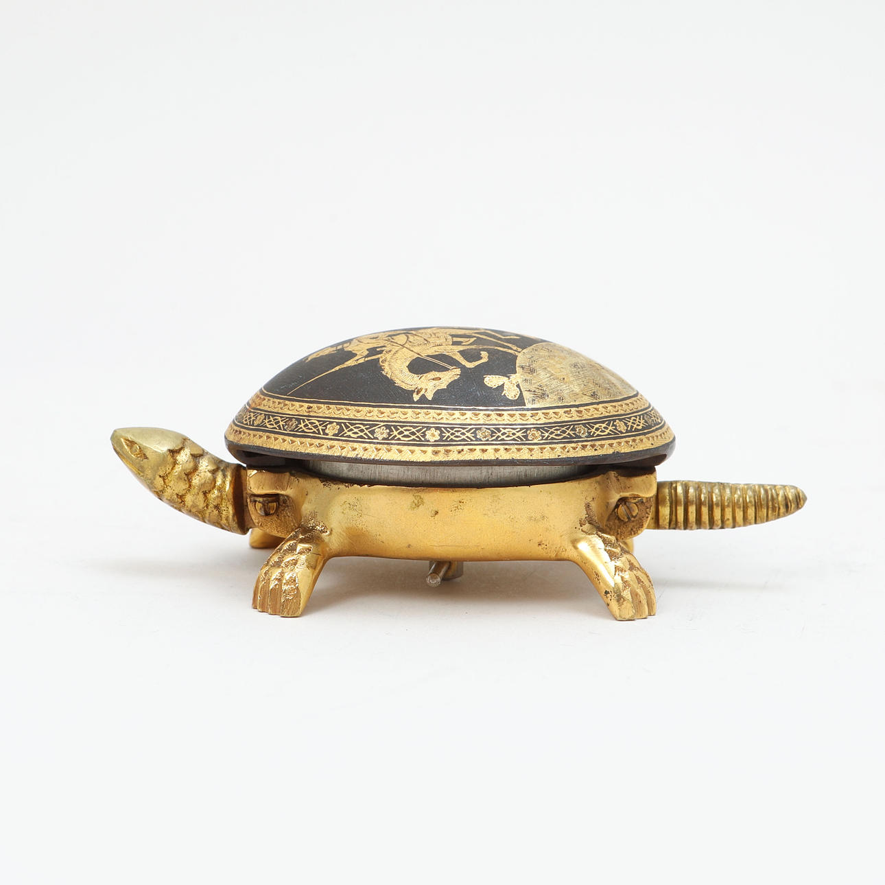 A TURTLE HOTEL CLOCK, brass, marked BOJ.