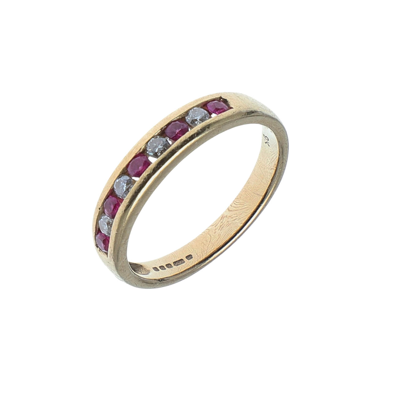 A RUBY AND DIAMOND HALF HOOP RING.