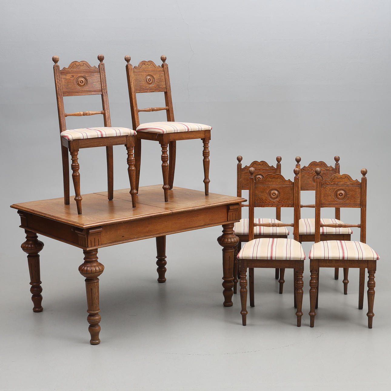 DINING GROUP. Neo-Renaissance style, oak, 7 pieces.