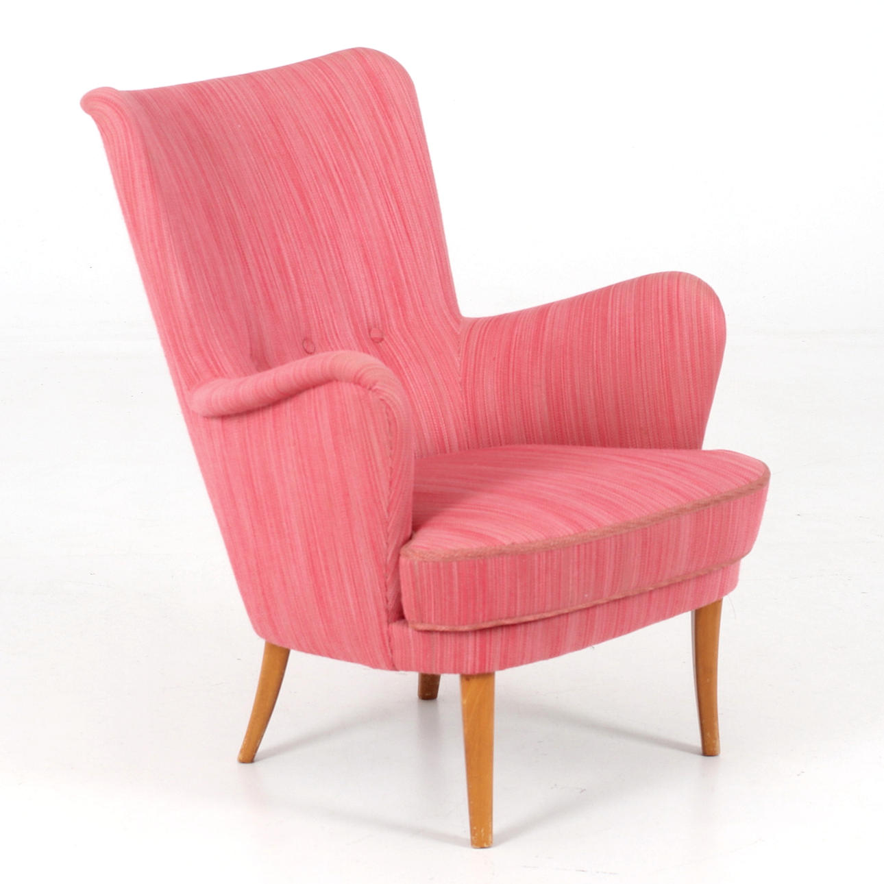 A mid 20th century textile armchair.