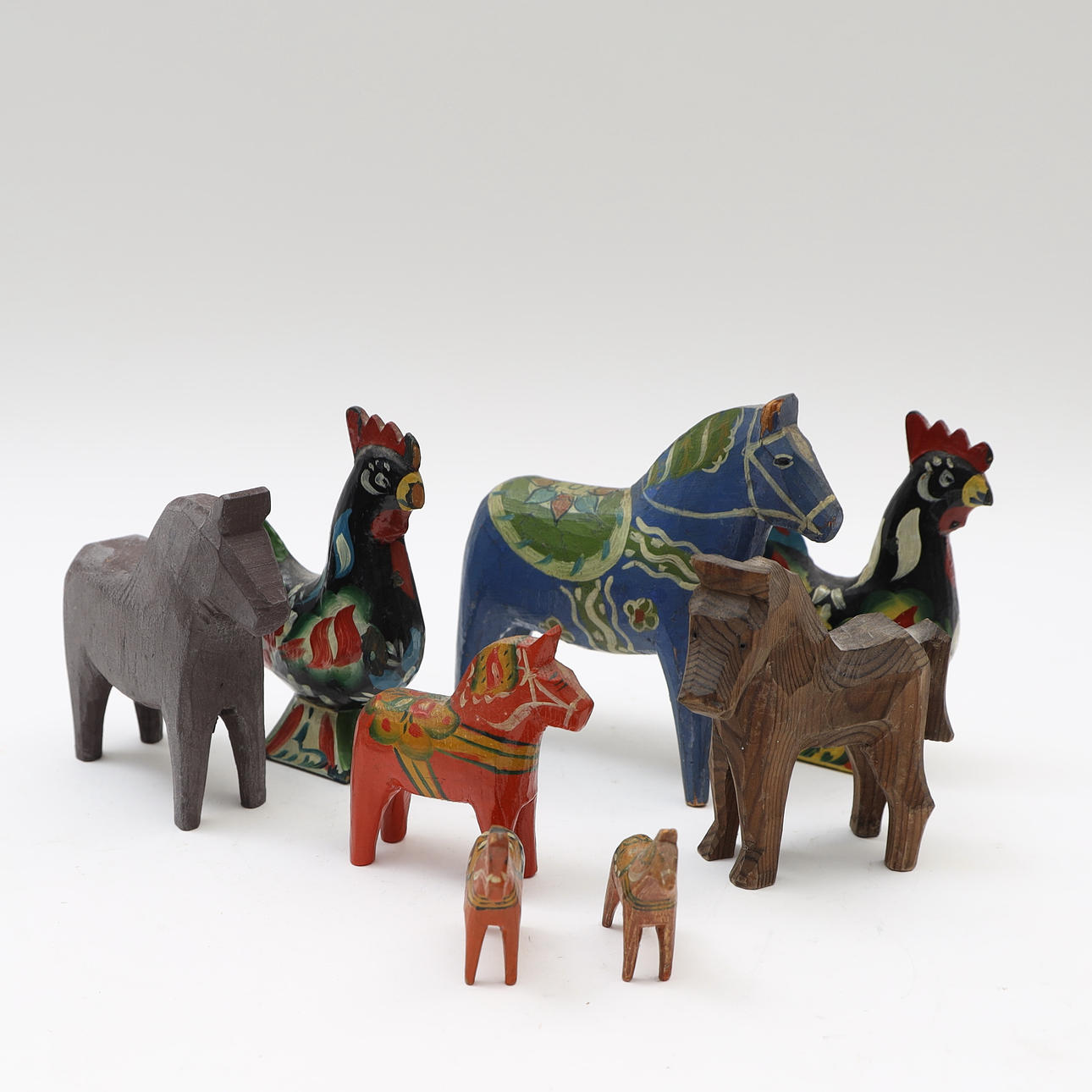 DALAHORSES AND ROOSTERS.