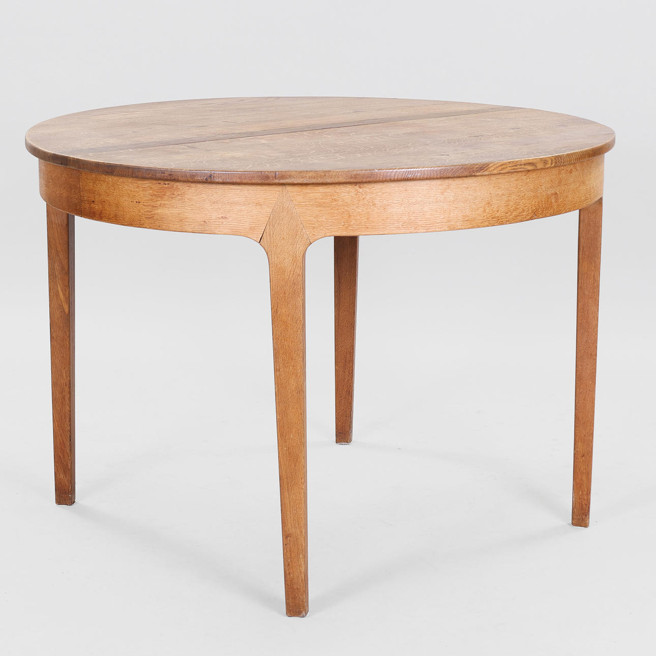 Circular oak dining table, Denmark, mid 20th century.