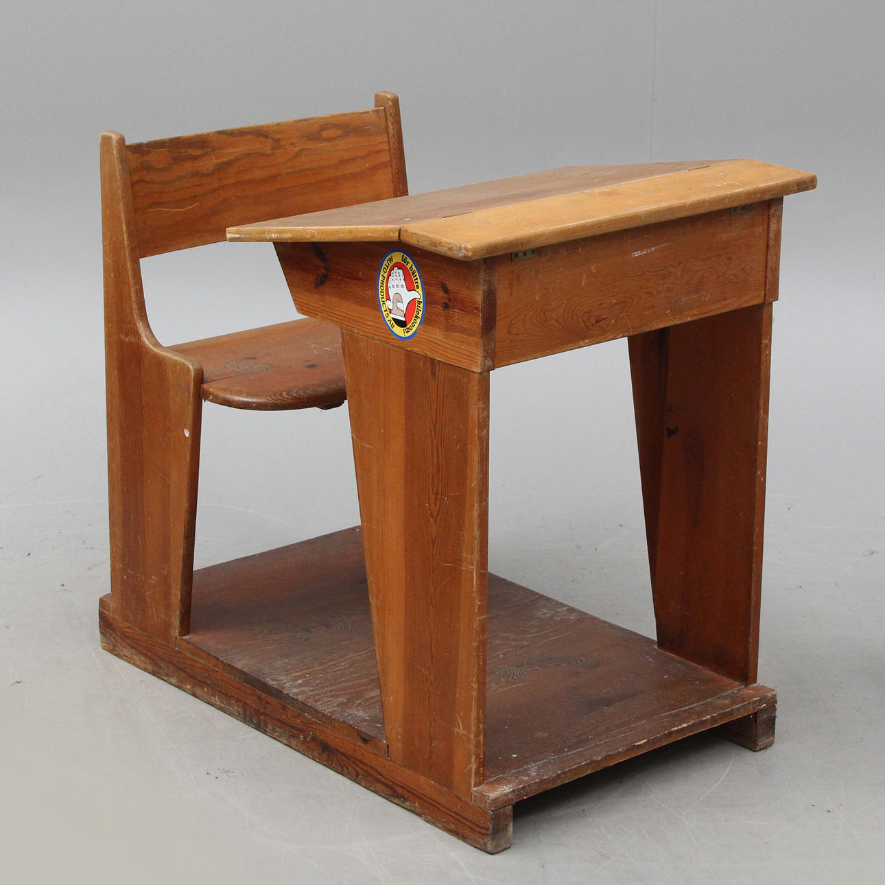An early 20th century school bench.