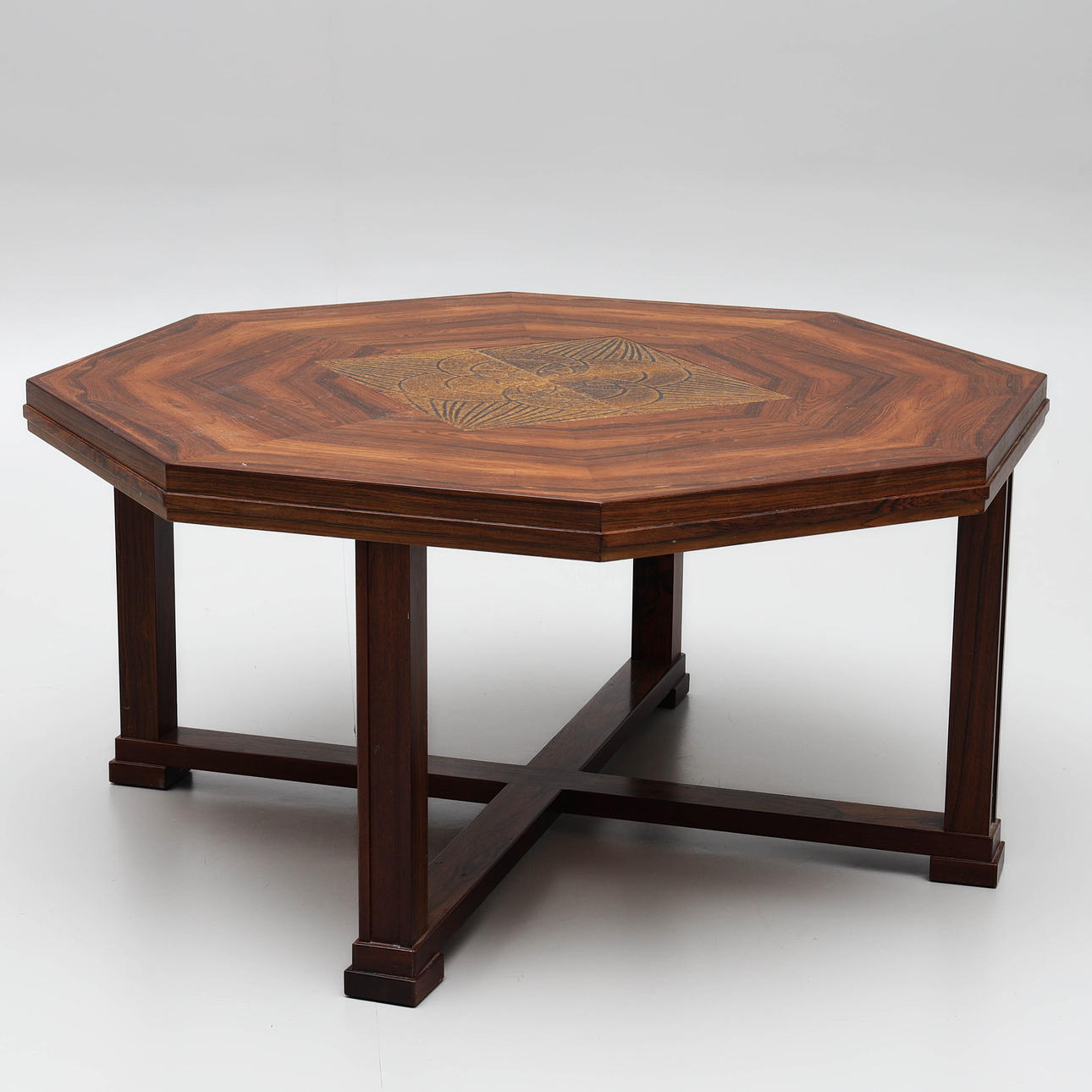 An 8-cornered jacaranda coffee table from the 1960s.