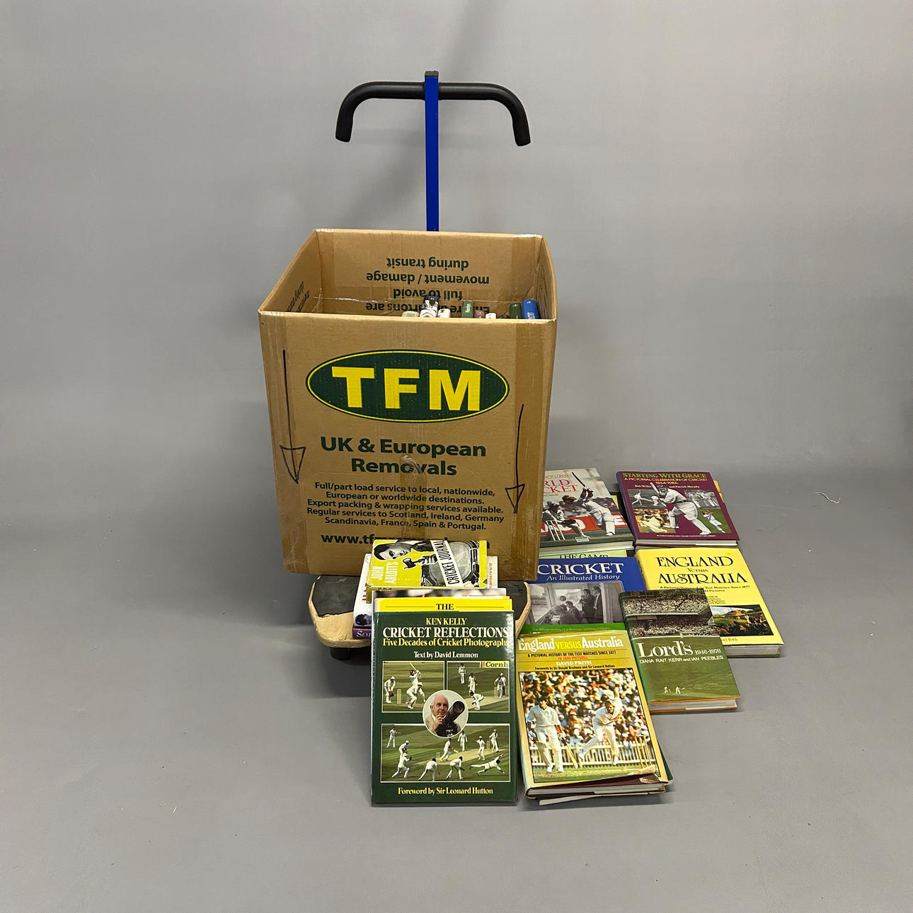 BOX OF HARDBACK CRICKET BOOKS.