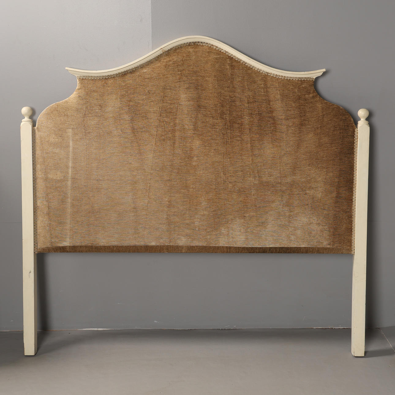 A FRENCH STYLE HEADBOARD.