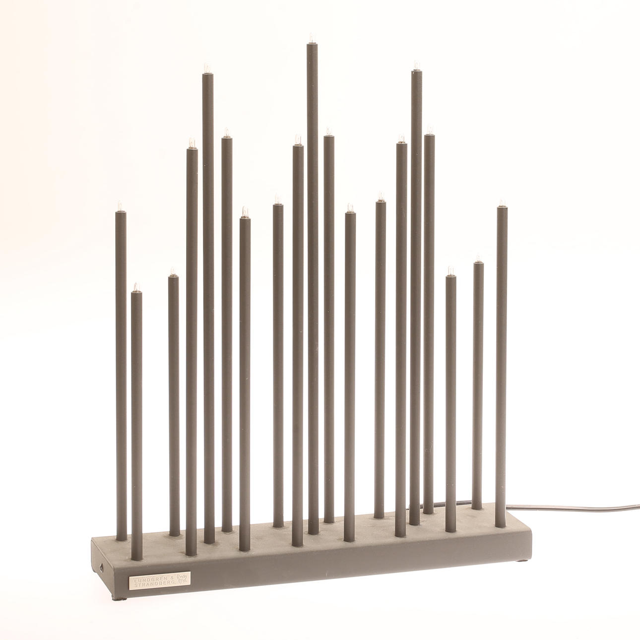 A metal candlestick, “Elflugan”, Lundgren & Strandberg.