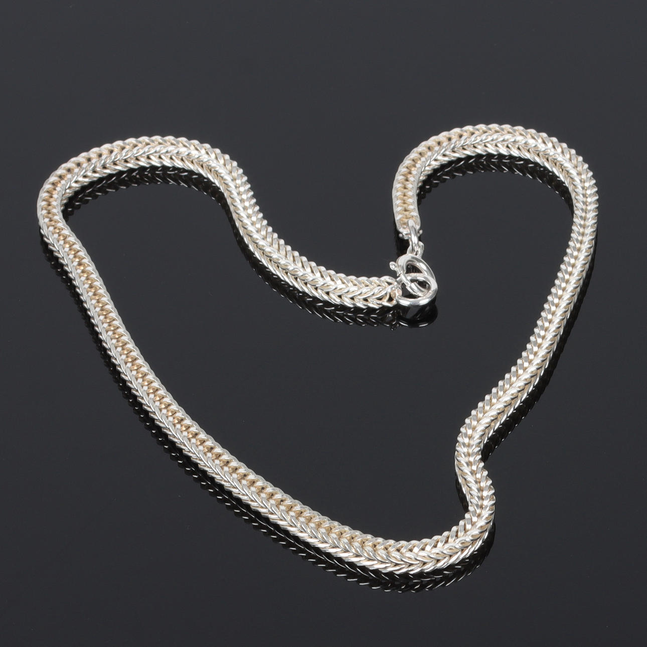 A silver double herringbone link necklace, 20th century.