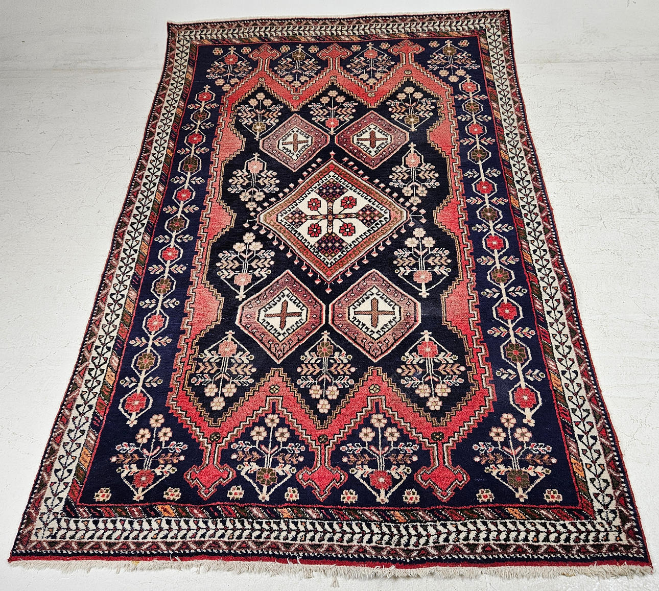 An oriental rug, approx. 245x160 cm.