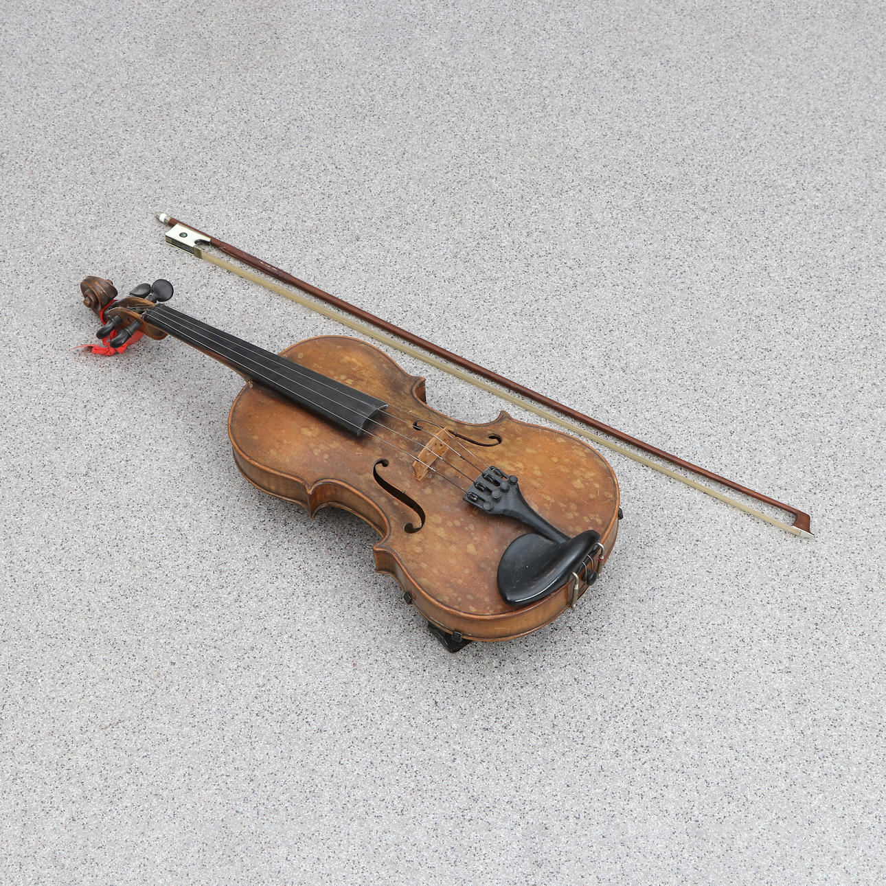 VIOLIN WITH STRING. The violin inside labeled: Refurbished by E. O. Berg, Örebro in 1917.
