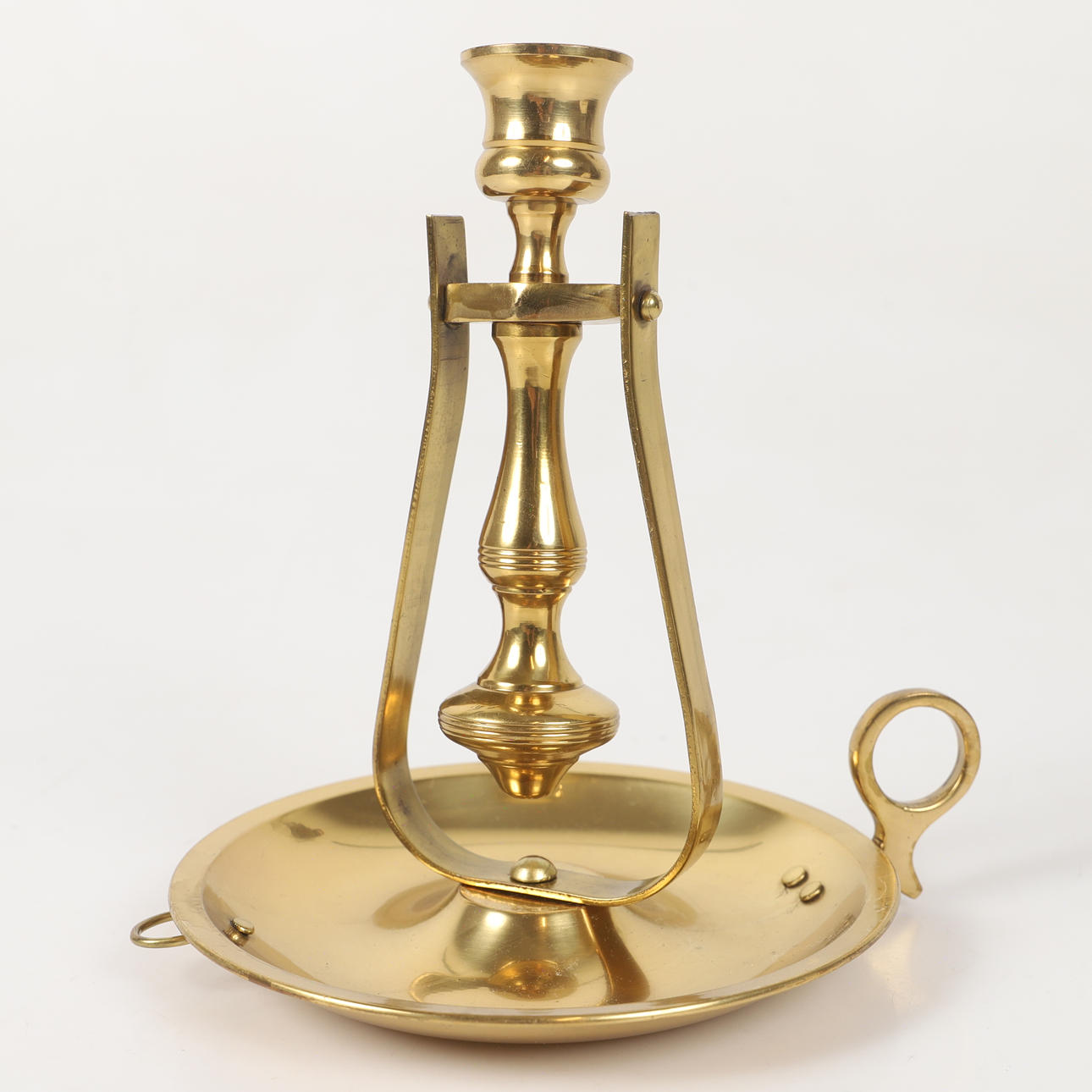 A wall/table candlestick, brass, 20th century.