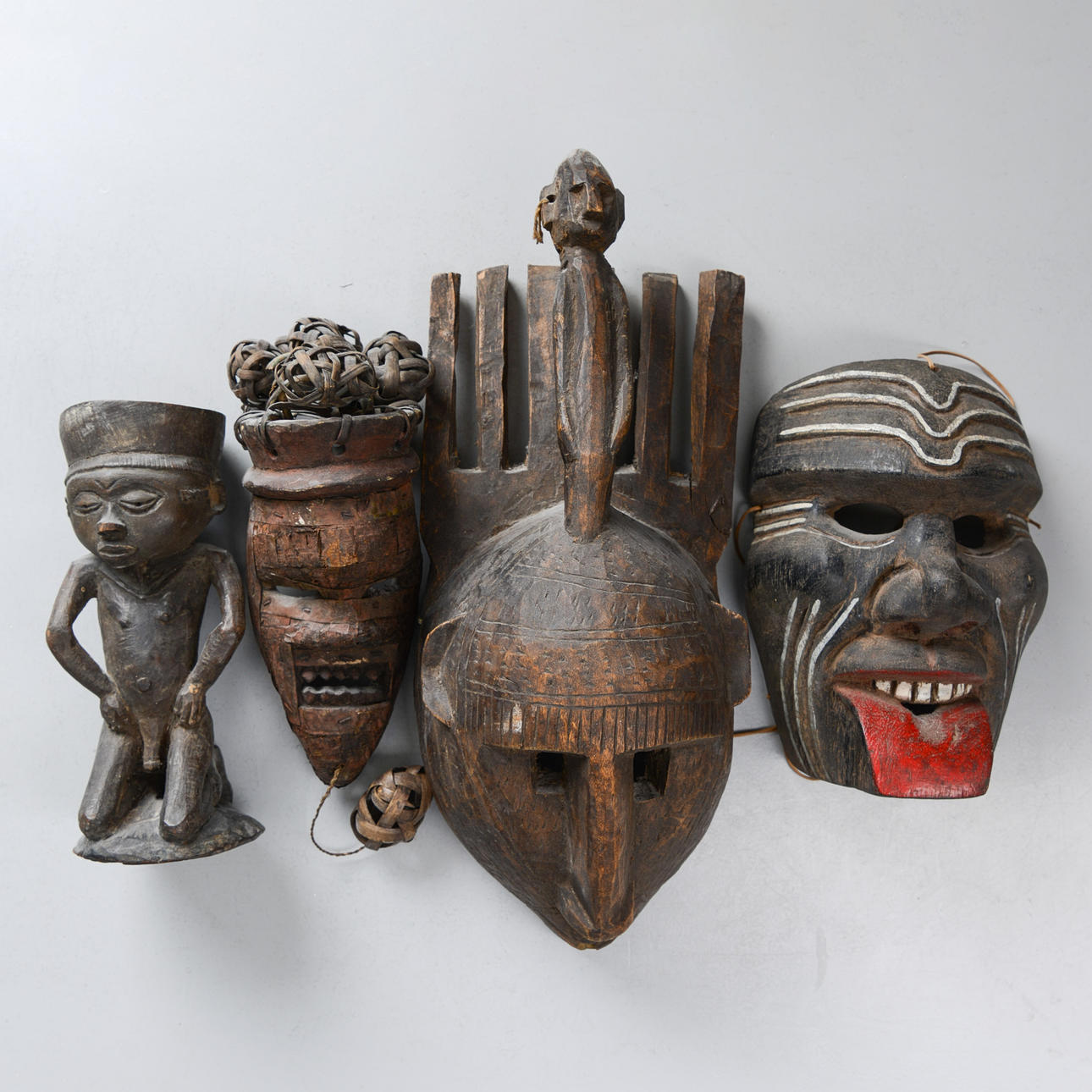 FOUR MASKS & SCULPTURES, Africa.