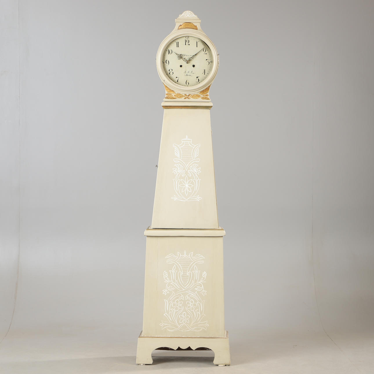 A painted floor clock, Mora, dated 1787.