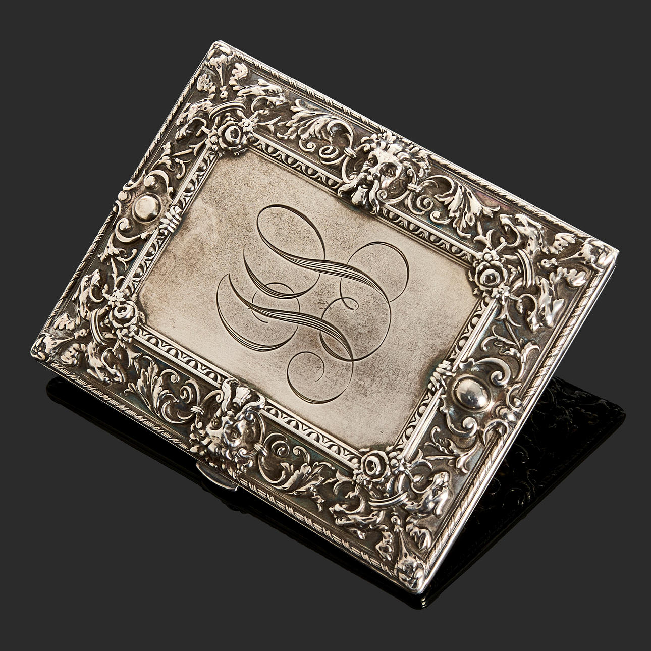 CIGARETTE CASE, sterling silver, embossed decor, gilt inside.