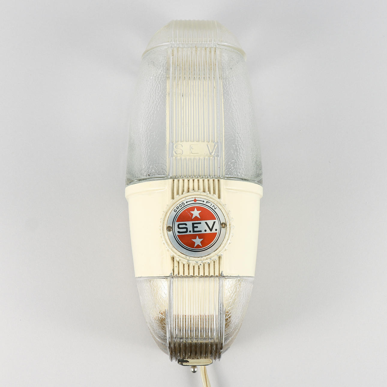 An electric coffee grinder, S.E.V., mid 20th century.